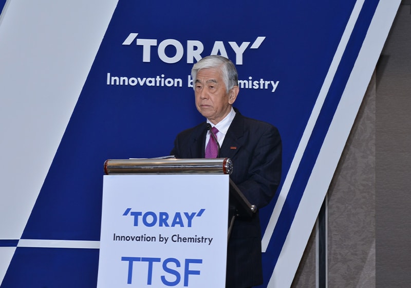 Toray Industries President and TTSF Honorary Chairman Akihiro Nikkaku presents his remarks.