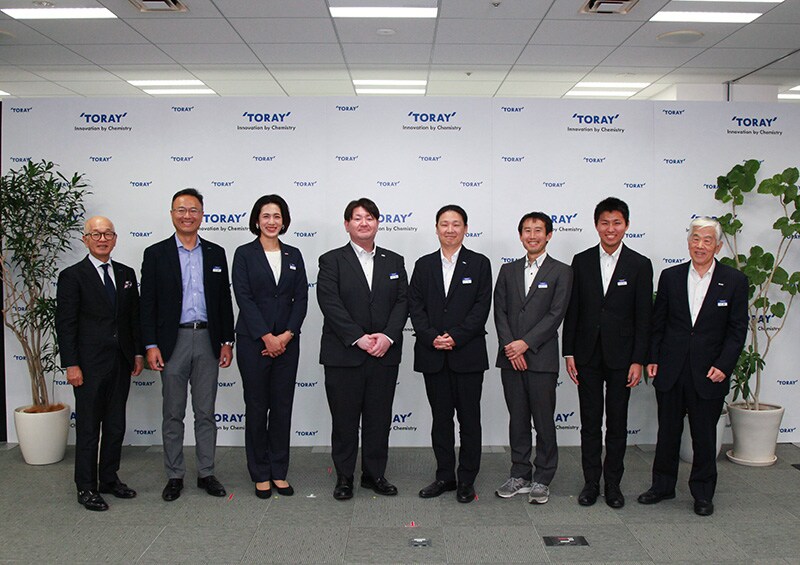 Group photo Toray Nagoya Plant 49 people from 15 families